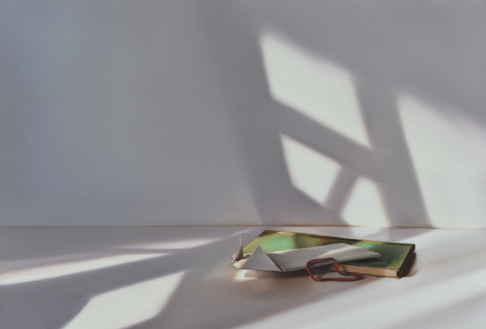 Grünes Buch mit Brief