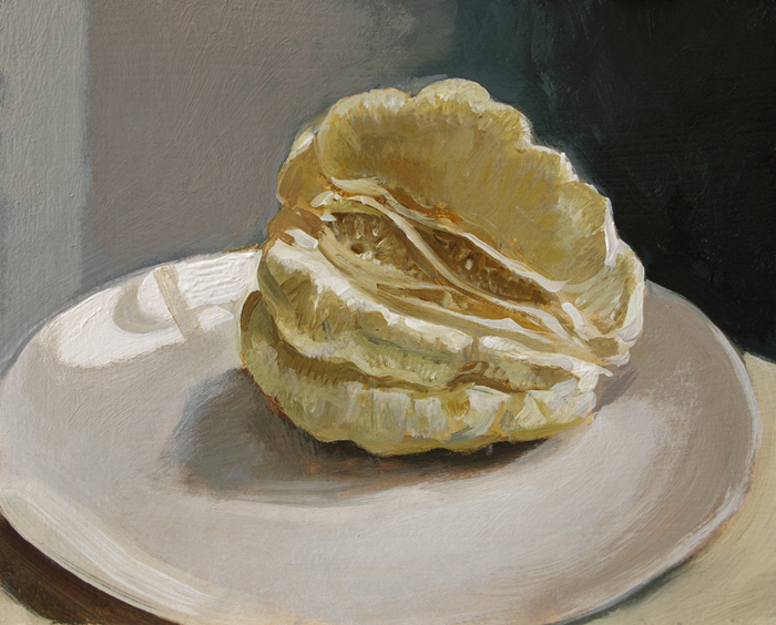 2616 - Pomelo auf weissem Steingutteller