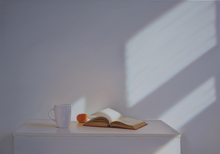 Weisse Tasse mit Mandarine